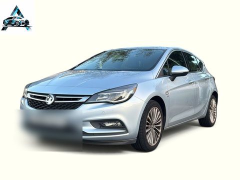 After: the same car cut out onto a clean background with a dealer logo added